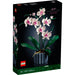 Set LEGO® Botanicals Orquídea (10311) con flores blancas y rosas, hojas realistas y maceta azul, ideal para decoración del hogar u oficina.